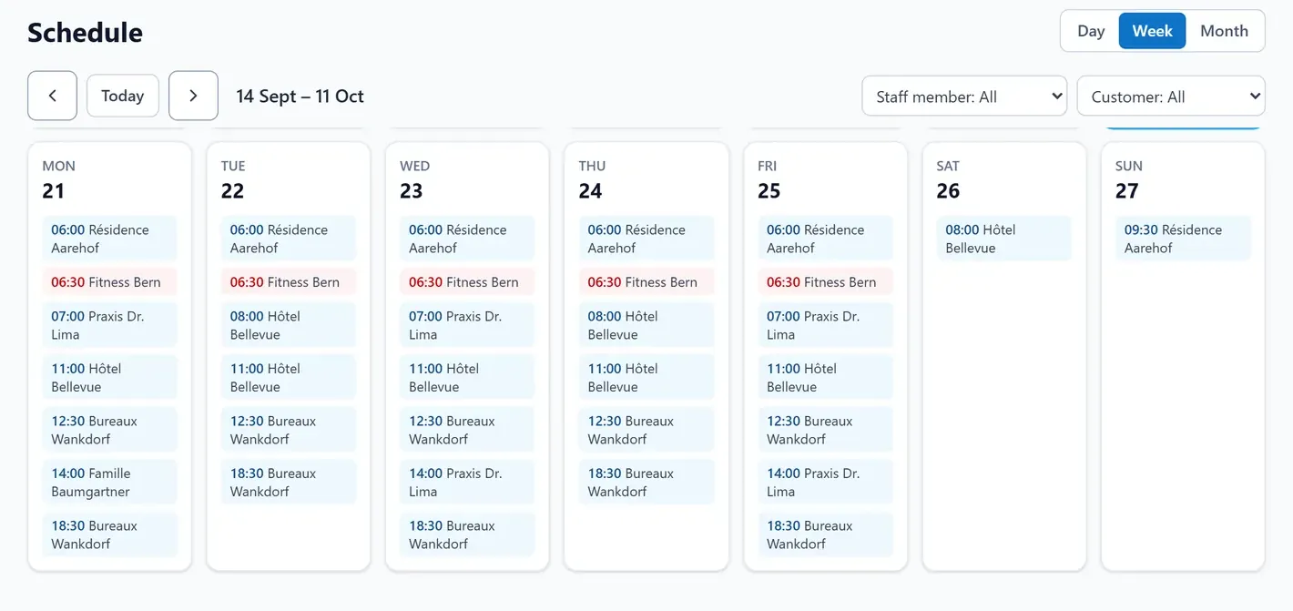 The schedule on a computer, week view: short-staffed jobs stand out in red.